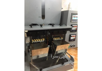 پرکن قرص و کپسول داخل قوطی در تهران طراحی و مهندسی کشاورز دستگاه پرکن