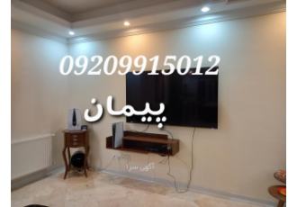 نصاب نصب پایه براکت دیواری تلوزیون روی دیوار شرق تهران