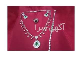 نست نقره قالب طلا نگین طرح اشک نقره ست کامل قالب طلا وزن 46گرم و360سوت