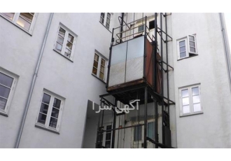 نصب آسانسور در نمای ساختمان تجاری مسکونی