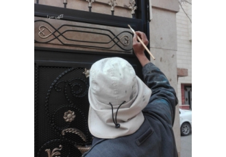 نقاش ساختمان نقاشی و رنگ آمیزی ساختمان درب پارکینگ کرج
