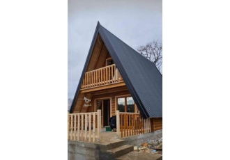 ساخت کلبه چوبی سویسی باشاسی آهن منصف ساخت کلبه چوبی سویسی باشاسی آهن