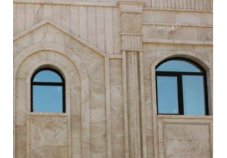 در و پنجره دوجداره شرکت عایق گستر یزد تولید کننده و مجری درب و پنجره